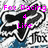 Pixelated image with pink text 'Fox Racing 4 Life' over a black and white abstract shape resembling a stylized fox head.