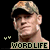 Two side-by-side pixelated frames of a person wearing a camouflage cap with black brim, showing slight facial expression differences against a black background with "WORDLIFE" text and small green symbols below.