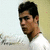 Pixelated close-up of a person with short dark hair wearing a white shirt against light background.