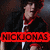 Pixelated image of a person with dark hair and red clothing holding a microphone, overlaid by bold red text reading "RICKJONAS".