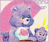 Purple bear with pink heart on chest holds small purple cub, both against pink and yellow background; text 'harmony bear' above.