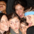 A pixelated group photo of multiple people on a red background with yellow text reading "friends are like stars, they come and they go but the ones that stay are the ones that glow".
