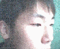 A sequence of four horizontal showing a person's face transitioning from closed eyes to open eyes with subtle head movements against a teal background