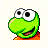 Pixelated green cartoon character with large white eyes and black pupils, wide open mouth showing red tongue, orange base on bottom right, yellow checkered background.
