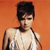 Pixelated image of a person with short dark hair wearing a white sleeveless top against an orange background.