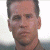 A pixelated image of a person with short hair against a light background, next to green text reading 'Original Icons .com' on dark green.