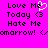 Pixelated text on bright pink background with animated heart symbol replacing 'o' in 'Love Me Today'.