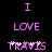 Pixelated text in pink on black background reads "I LOVE TRAVIS" with white sparkles on the 'T' and 'V' in the second instance.