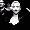 Black-and-white animated sequence showing a person in a dark jacket with a light collar performing sequential hand gestures against a black background.