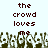 Pixelated text reads 'the crowd loves me' above a crowd of raised hands in a light background.