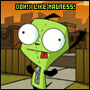 Green cartoon character with large white eyes and red mouth stands in front of wooden fence, repeating 'Ooh! I like madness!' text above.