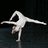 Animated sequence of a dancer in white performing acrobatic poses against black and white backgrounds with motion blur effects.
