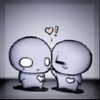 Two gray cartoon characters with heart-shaped eyes and hearts on their chests stand close together against a light background, one winking while the other has wide eyes, with floating heart and exclamation mark symbols above them.