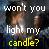 Pixelated image with overlaid text reading "won't you light my candle?" in white and yellow fonts against a dark background.