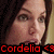 Pixelated close-up of a person's face with dark hair, red text reading 'Cordelia <3' at the bottom.