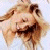 A split-frame contact sheet showing a pixelated image of a person with long blonde hair on the left and green text reading "Original Icons .com" on a dark green background on the right.