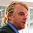 A pixelated contact sheet showing two frames of an animated buddy icon featuring a person with blonde hair and red text reading "Along Came Polly" on the right side.