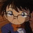 A pixelated anime-style character with brown hair and glasses appears on the left side of a contact sheet, while the right side displays stylized text "Anime IM" above smaller text "COM" against a black background.
