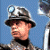 Animated contact sheet showing two frames of a pixelated character in military gear with green text logo on dark background.