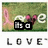 A static image of the word 'love' formed by white letters on a green grassy background, with pink and dark red heart-shaped elements.