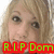 A pixelated close-up of a person's face with light brown hair, featuring green text "R.I.P Dom" on a red background at the bottom.