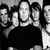 Static black-and-white photo of five people on left with red pixelated text reading THIS HEART IS DESPERATION on right, all within a 50x50 buddy icon frame.