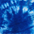 Blue-toned pixelated image with abstract light patterns and a solid gray rectangle in the bottom-right corner.