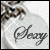 A circular icon with a light gray background features the word 'Lacy' in dark cursive script, bordered by a blurred patterned edge.