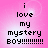 Pixelated text on a pink gradient background with four identical showing 'i love my mystery BOY!!!!!!!!!!' in black block letters