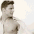 A pixelated contact sheet showing two frames of an animated icon with a shirtless man on the left and green text reading "Original Icons .com" on the right against a dark background.