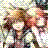 Pixelated static image of two figures in close physical contact with overlapping limbs and indistinct facial features against a light checkered background.