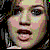 Pixelated static image of a person's face with visible dithering and color bleeding, rendered in low-resolution 256x256 pixels on a black background.