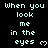 Pixelated text repeats 'When you look me in the eyes' with small heart symbols on a black background, displayed across multiple