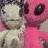 A pink cartoon character with large eyes and a white creature holding a small object, next to 'Best Friends' text on a starry background.