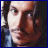 Animated contact sheet of Johnny Depp's face with progressive text animation from 'J' to 'JOHNNY FAN' across 21 frames, displayed in a 5x5 grid on gray background.