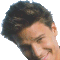 Two side-by-side pixelated headshots of a person with dark hair, one angled left showing partial face and the other facing forward against gray background.