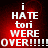 Red background with white pixelated text reading "i HATE tori WERE OVER!!!!!!" in four identical arranged in a
