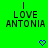 Green background displays 'I LOVE ANTONIA' text with blue pixelated heart symbols below, showing animation change between frames.