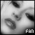 A black-and-white pixelated image of a person's face with text reading 'FAN OF CHRISTINA' in four