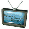 Three CRT televisions with antenna displays showing aircraft scenes: jets in flight, a white jet on blue background, and an aircraft on ground.