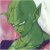 Pixelated green figure with pointed ears and a white eye, set against pink and light gray background.