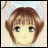 A pixelated anime-style character with brown hair and large eyes on the left, next to stylized text reading "Anime IM" above a smaller "com" on a black background.