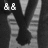 Black-and-white animated icon shows a person in a suit with striped pants, text fragments 'i wanna hold your hand' and 'hand' with a heart symbol.