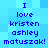 Blue pixelated text on a blue background, repeating 'I love kristen ashley matuszak!' in two identical vertical