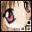 Anime-style face with large pink eyes and brown hair, showing subtle eye movement across frames.
