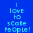 Blue background with cyan text reading "I LOVE to SCARE PEOPLE!" and pink horizontal bars shifting position across frames.