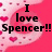 Pixelated pink background with scattered heart shapes and bold black text reading "I love Spencer!!" in three lines.