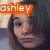 A pixelated image of a person with shoulder-length brown hair, showing two side-by-side views with orange text labels 'ashley' and 'marie' in the corners.