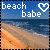 Pixelated beach scene with blue sky, ocean waves, and sandy shore; text 'beach babe' in white pixel font above a heart symbol.