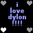 Pixelated text 'i love dylon !!!!' in light purple on black background with gray and white heart icons, partially obscured by gray overlay.